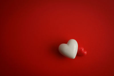 Close-up of heart shape over white background