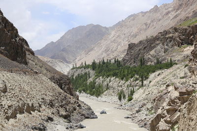 Panoramic view of road amidst mountains against sky