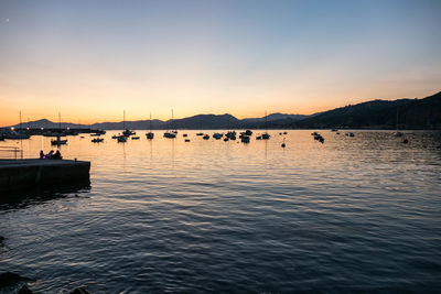 Scenic view of sea against sky at sunset