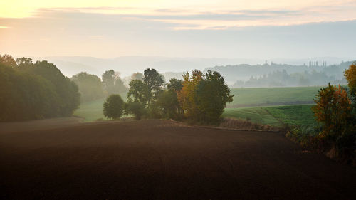 Scenic view of landscape against sky during sunset