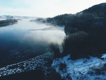 Scenic view of snow covered mountains