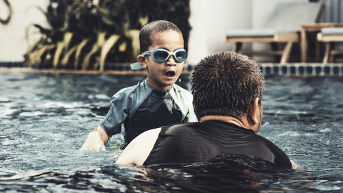 Portrait of boy wearing sunglasses outdoors