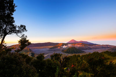 Scenic view of mountain against sky during sunset