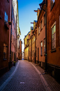 Narrow alley with buildings in background