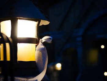 Close-up of illuminated lantern at night