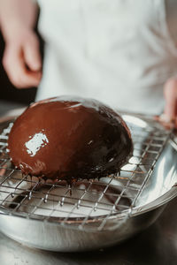 Midsection of man preparing food