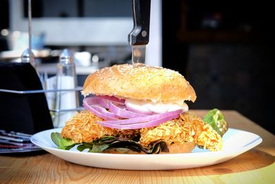 Close-up of burger on table