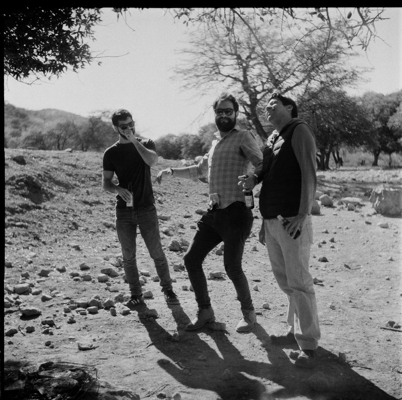 PEOPLE STANDING ON GROUND