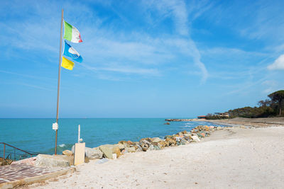 Scenic view of beach against sky