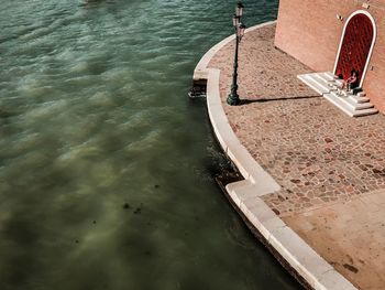 High angle view of swimming pool by sea