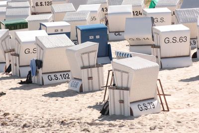 Hooded chairs on beach