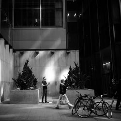 Man riding bicycle on city street