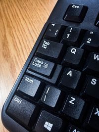 High angle view of computer keyboard on table