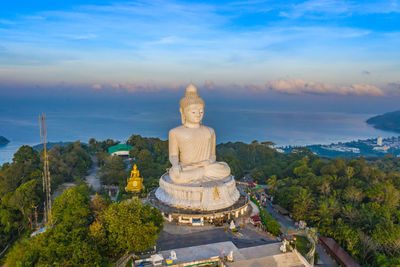 Statue of temple against sky