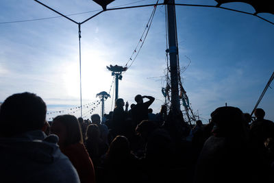 Silhouette of people enjoying in city