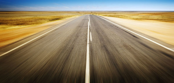 View of road passing through landscape