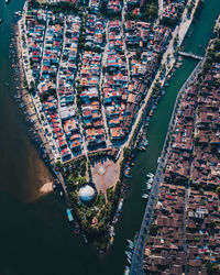 High angle view of marina and buildings in city