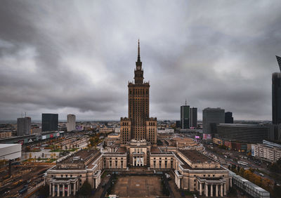 High angle view of buildings in city against sky
