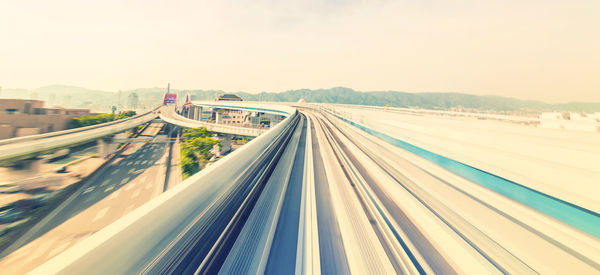 High angle view of train on highway against sky