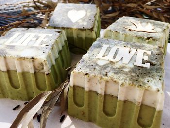 High angle view of homemade soaps on table