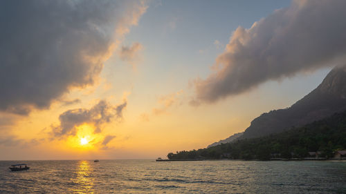 Scenic view of sea against sky during sunset