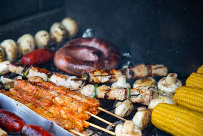 Close-up of meat on barbecue grill