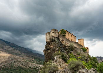 Low angle view of historic building against sky