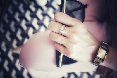 Close-up of woman hand holding mobile phone