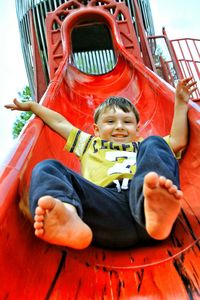 Portrait of happy boy in playground