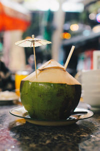 Close-up of coconut on table