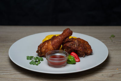 Close-up of food in plate on table