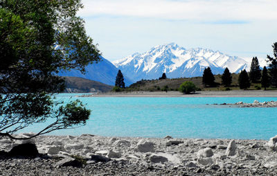 View of swimming pool with mountain in background