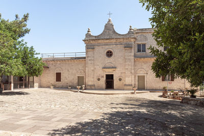 Exterior of historic building against sky