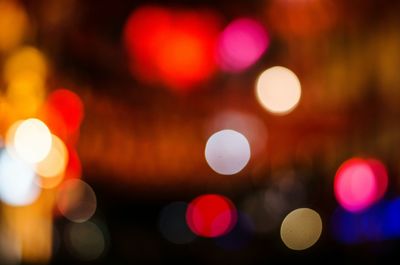 Defocused image of colorful illuminated lights at night