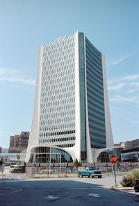 Low angle view of modern buildings against sky