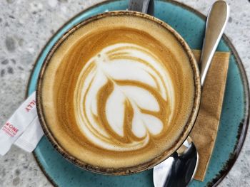 Close-up of cappuccino on table