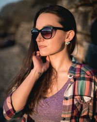 Portrait of young woman wearing eyeglasses