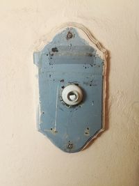 Close-up of old door handle on wall