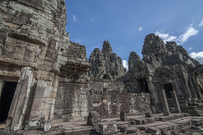 Low angle view of old temple against sky