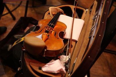 Close-up of two people playing piano