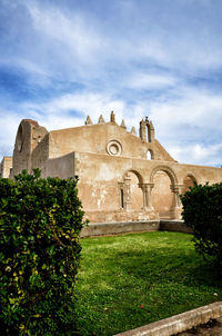 View of historical building against cloudy sky