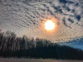 Scenic view of landscape against sky during sunset
