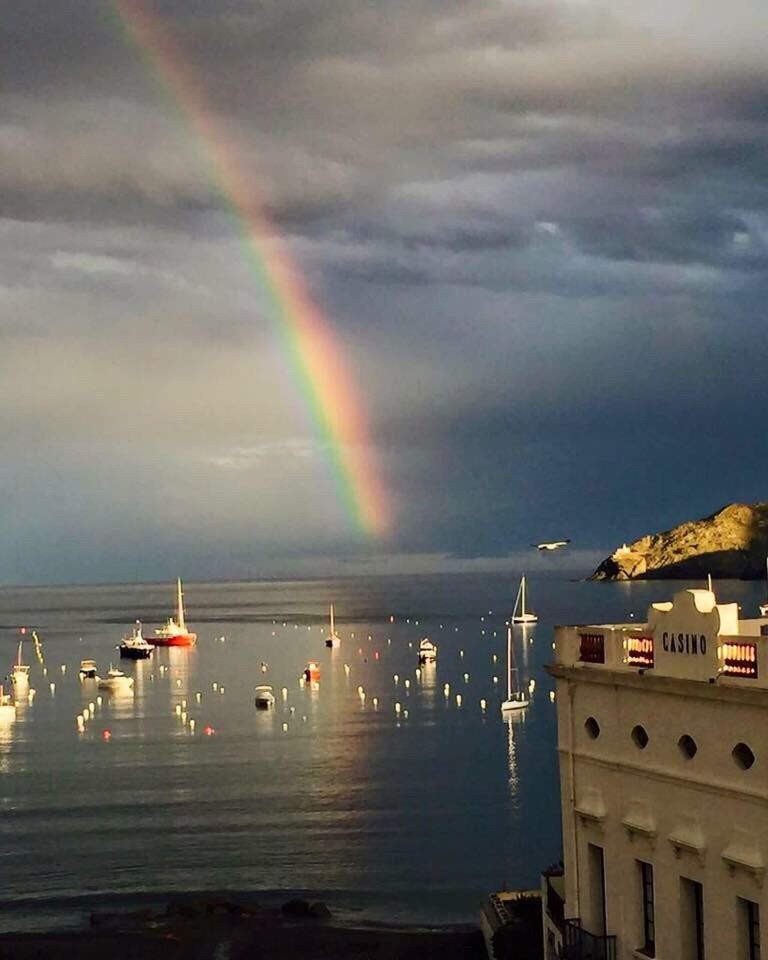 SCENIC VIEW OF RAINBOW OVER SEA