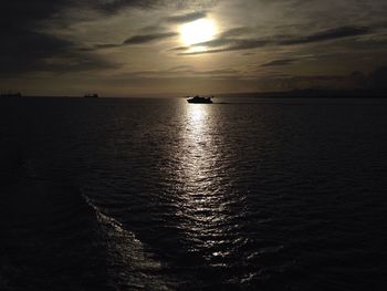 Scenic view of sea against sky at sunset