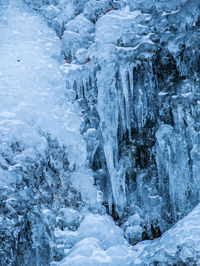 Scenic view of frozen waterfall