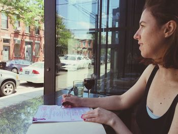 Woman looking at city