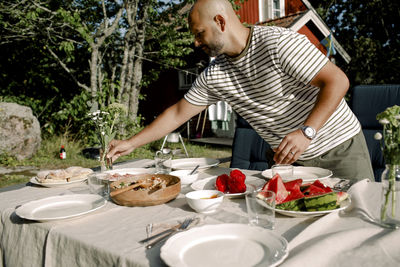 Midsection of man having food