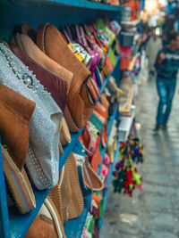 Close-up of clothes hanging at market stall