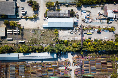 Top view of the industrial zone garages, warehouses, containers for storing goods. 