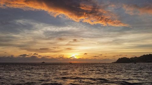 Scenic view of sea against sky during sunset